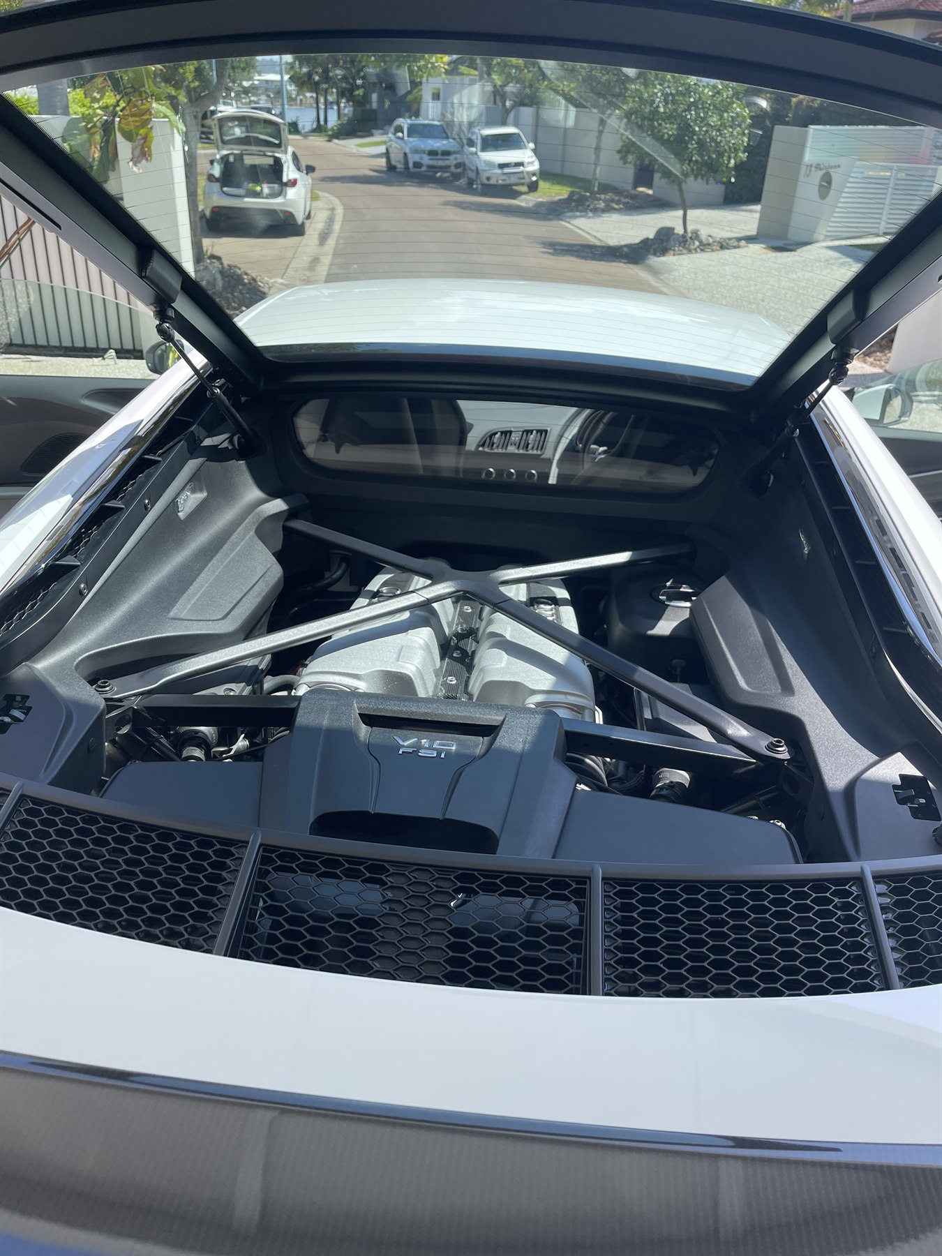 Clean Audi R8 V10 engine bay after professional detailing