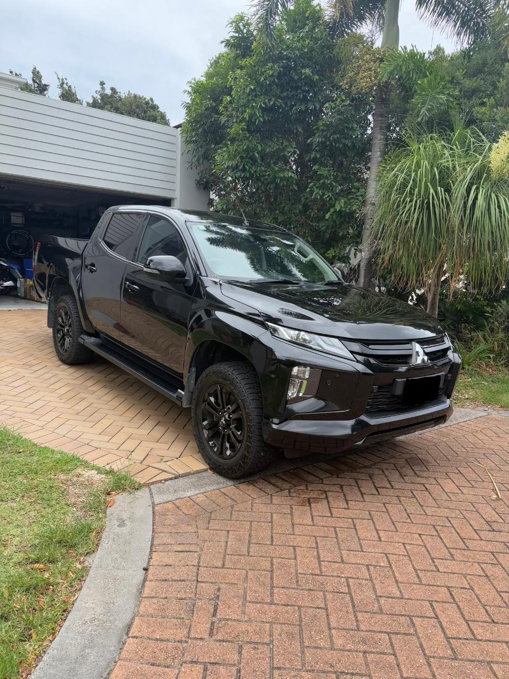 Black utility vehicle after an exterior detail